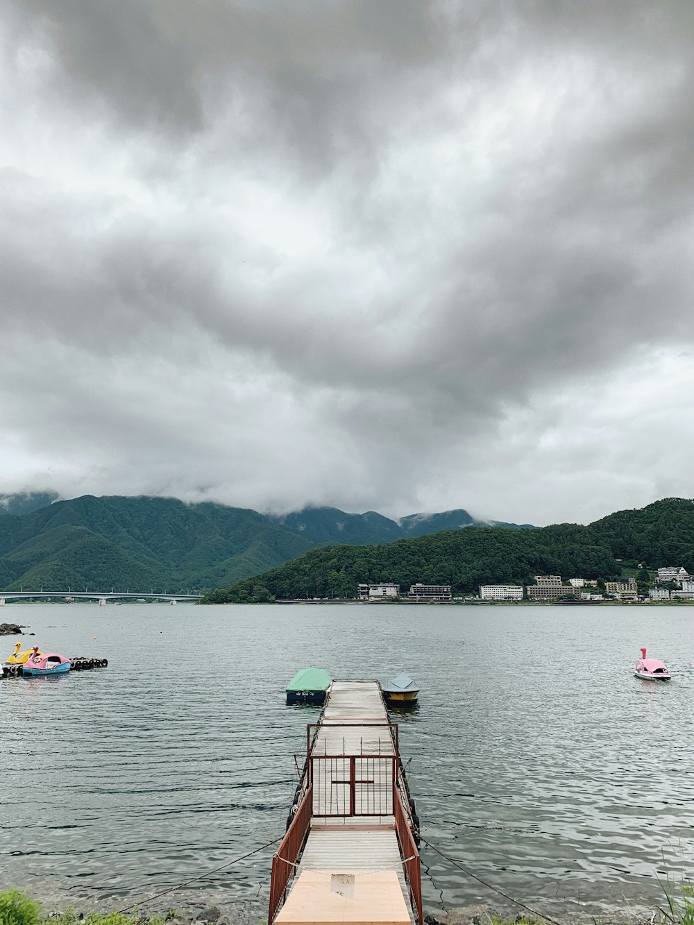 wooden dock in body of water