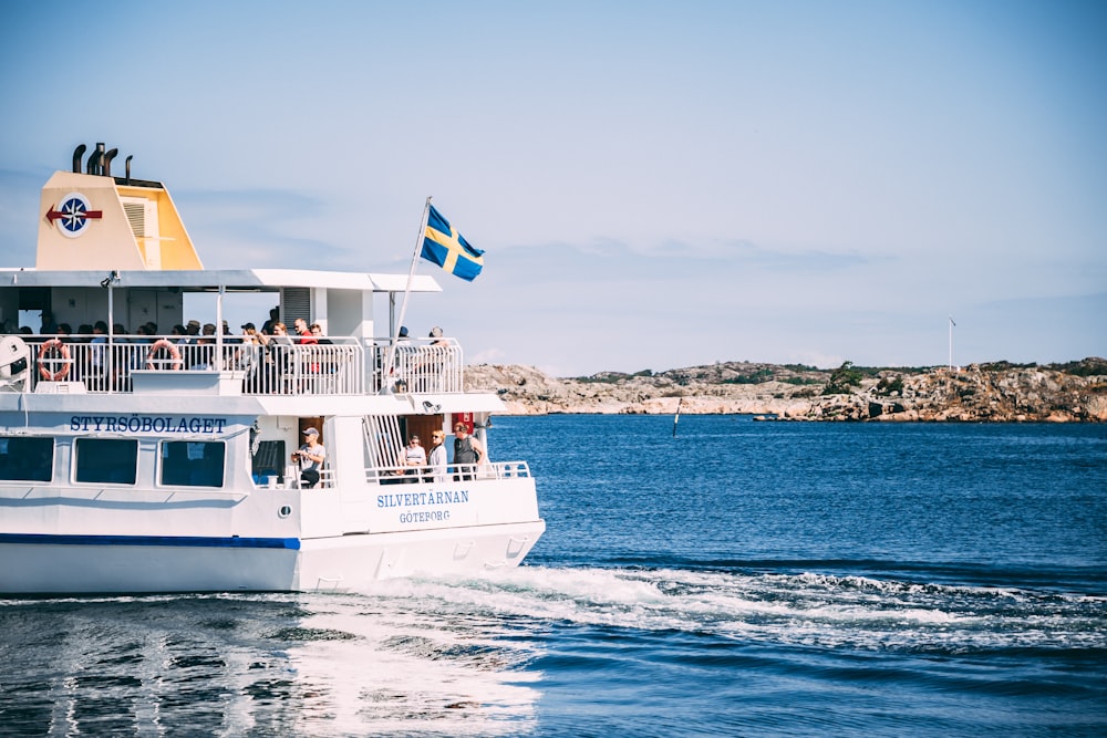 white passenger boat on sea