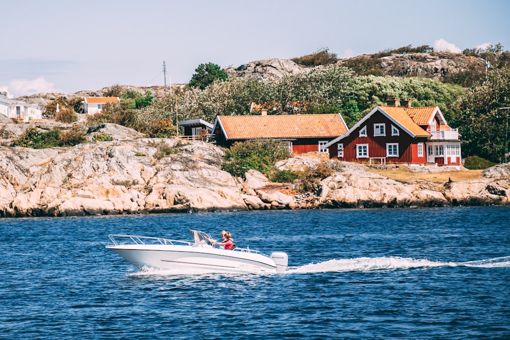 white speedboat at sea