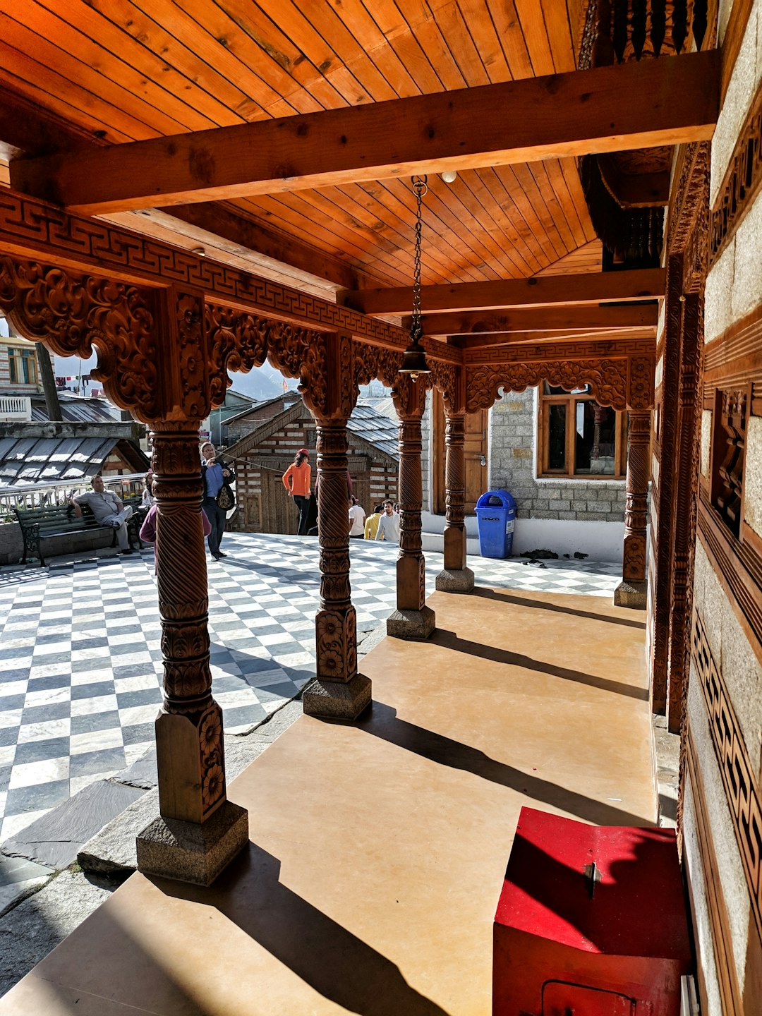  brown wooden building courtyard forecourt