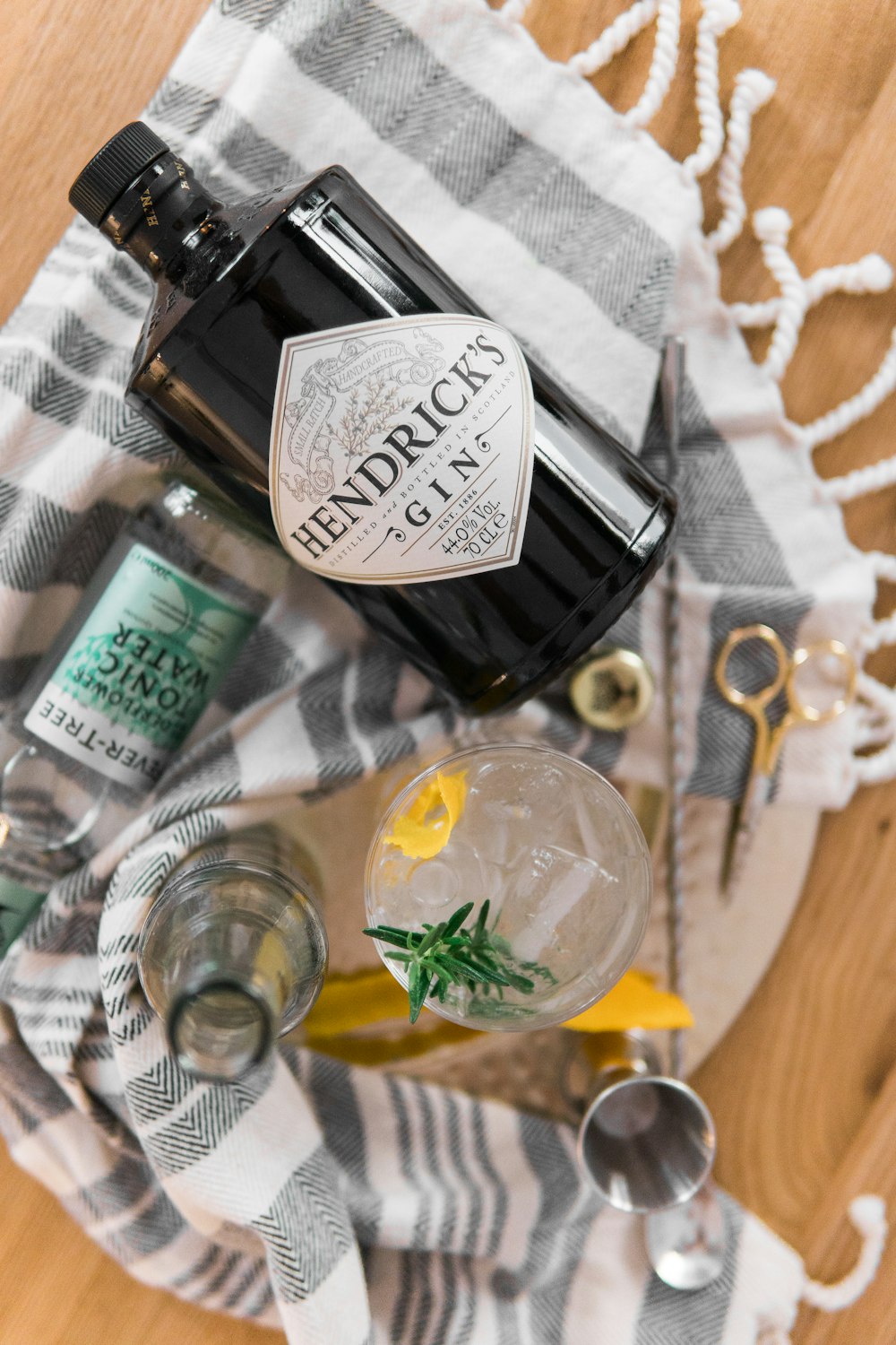 Hendrick's Gin bottle on grey textile