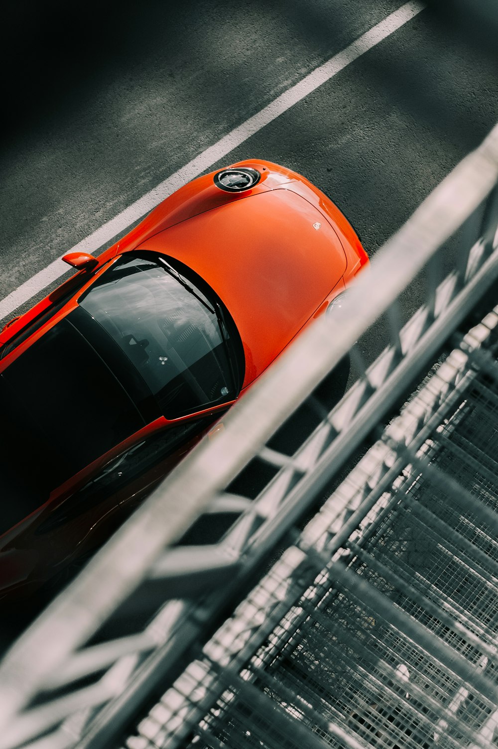 orange car on road