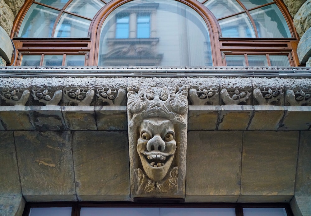 a close up of a building with a face on it