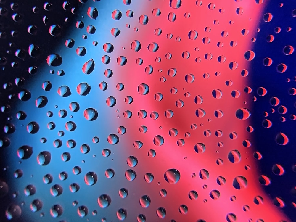 water droplets on clear glass surface