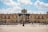 people outside brown concrete building