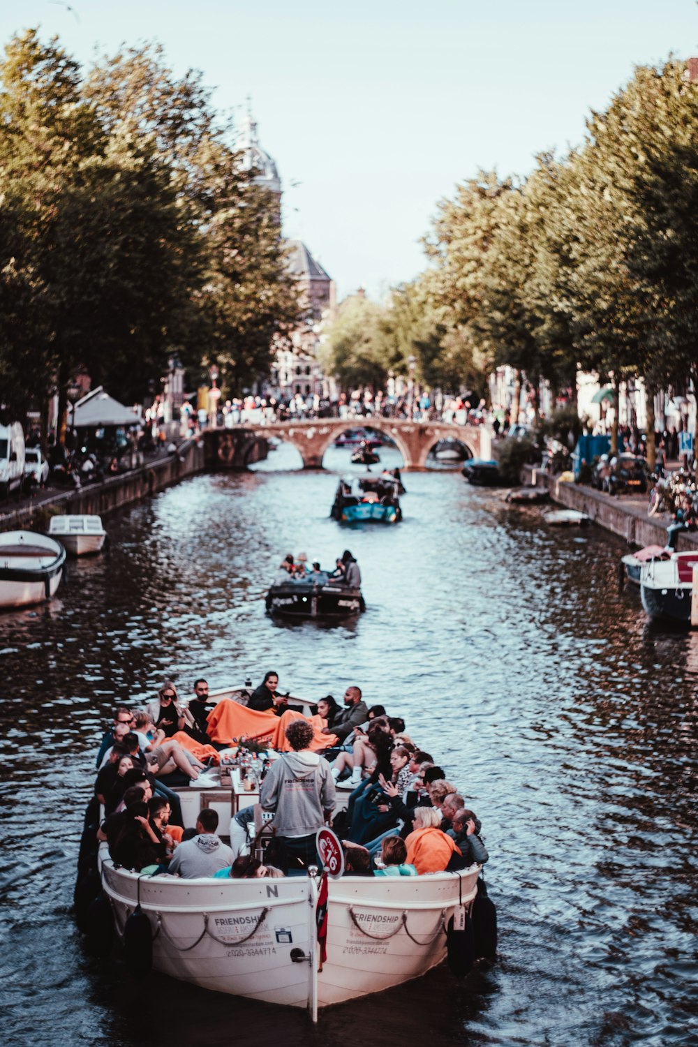 people riding boat during daytime