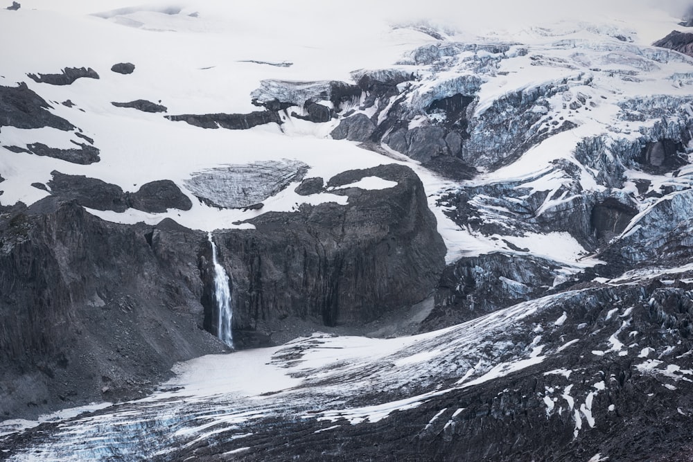 mountain range covered by snow