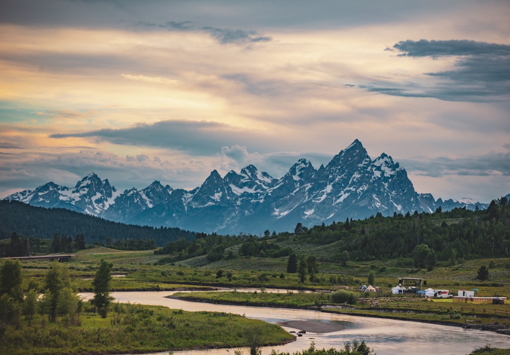 river and view of mountain during daytime