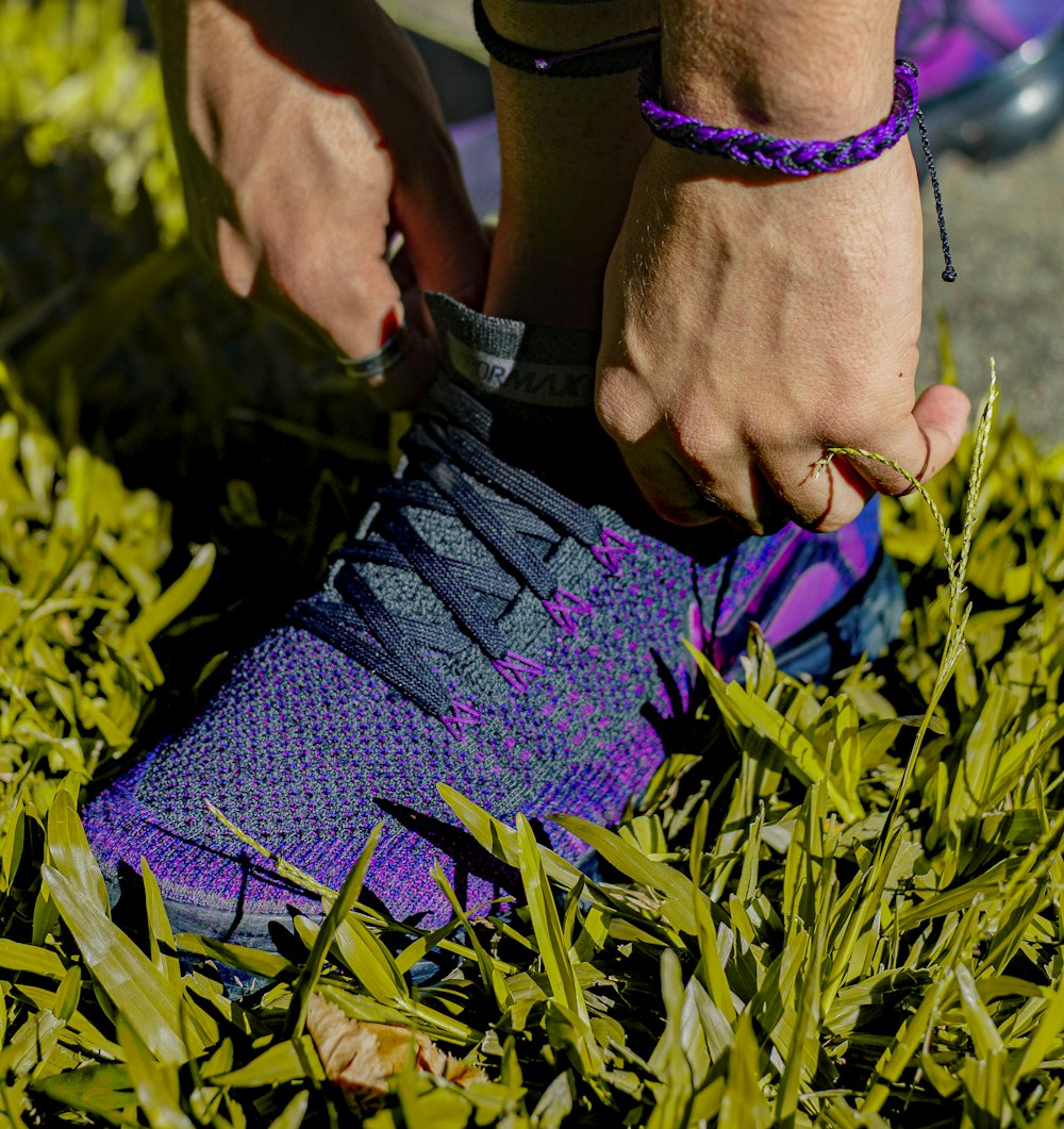 purple Nike athletic shoes