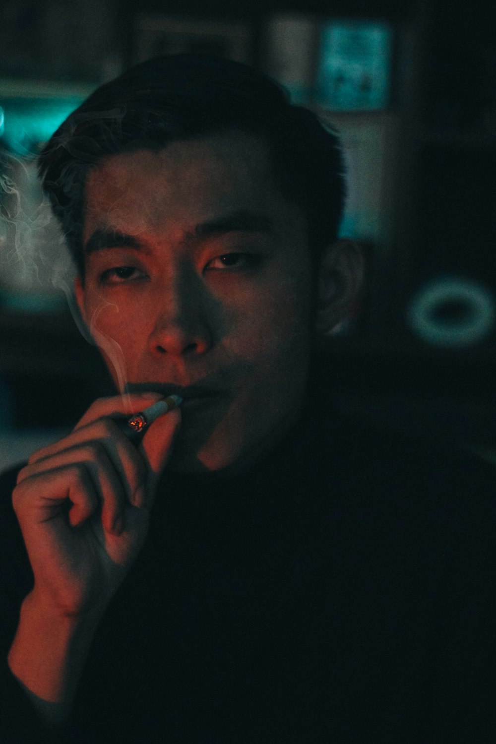 person having a cigarette close-up photography