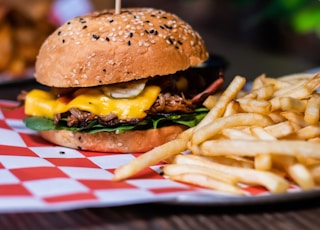 shallow focus photography hamburger on plate