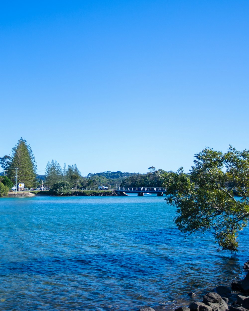 blue calm water at daytime