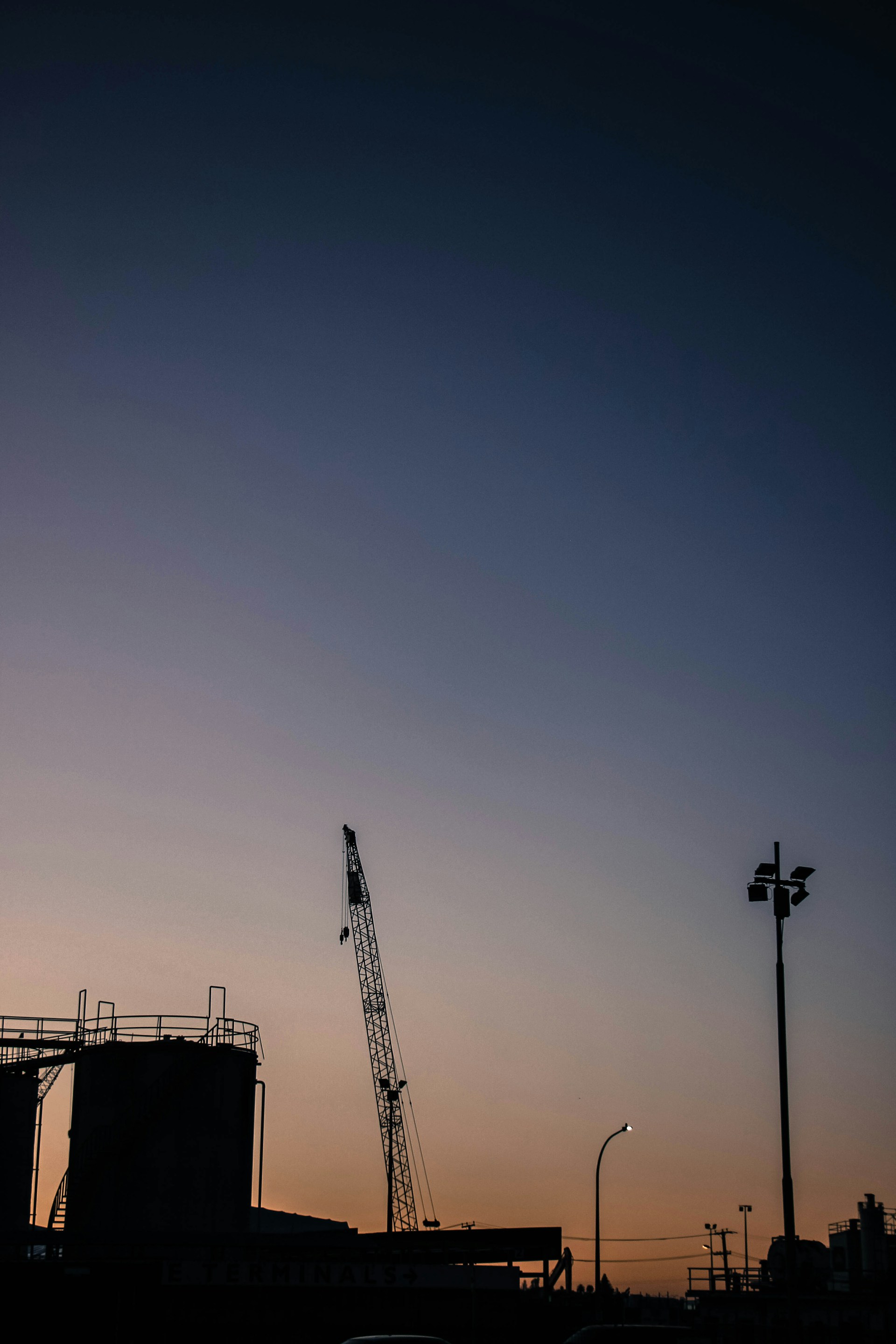 woman wearing yellow long-sleeved dress under white clouds and blue sky during daytime