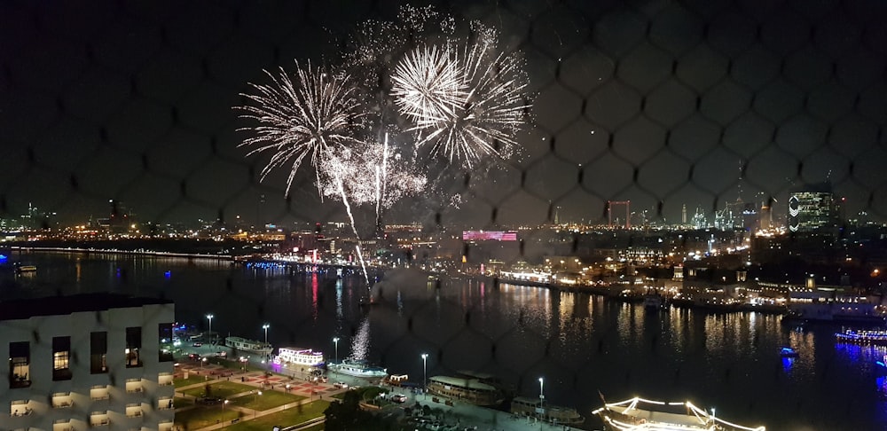 white and gray fireworks at nighttime