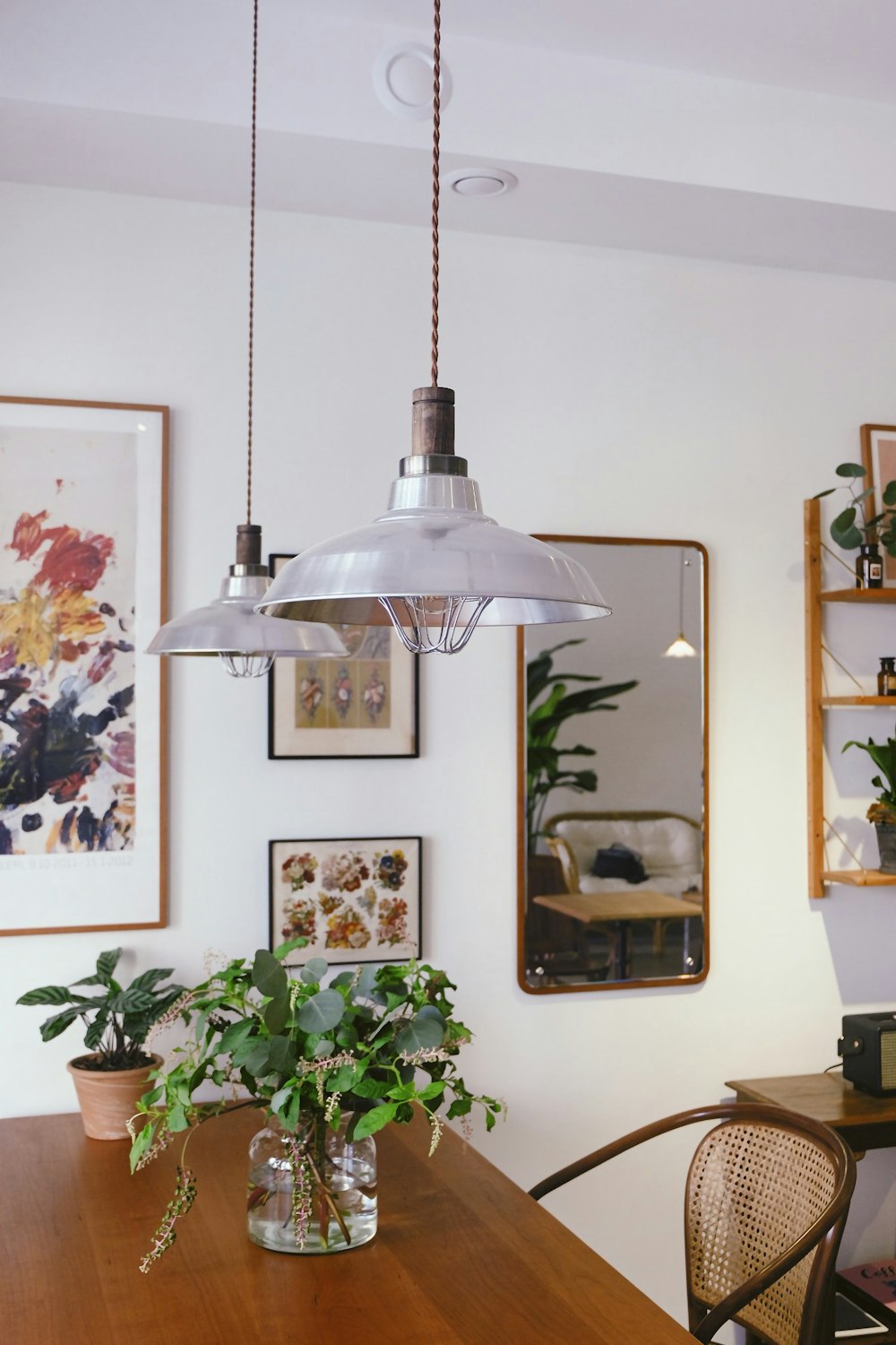 two white pendant lamps