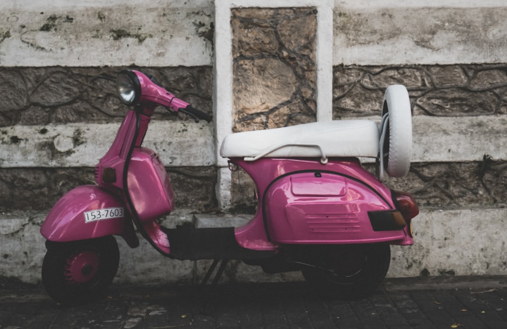 pink and black motor scooter
