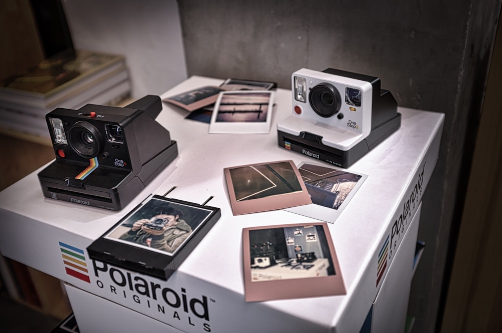 black and white Polaroid camera on box