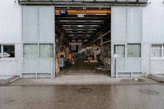 Modern warehouse filled with various industrial machines ready for sale