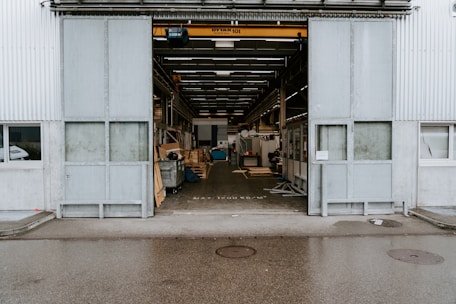 A warehouse filled with raw materials and machinery.