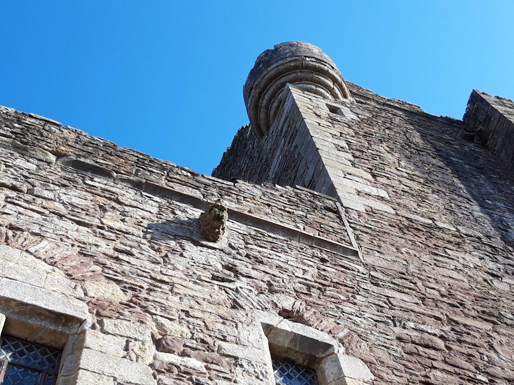 low angle photo of white and gray concrete building