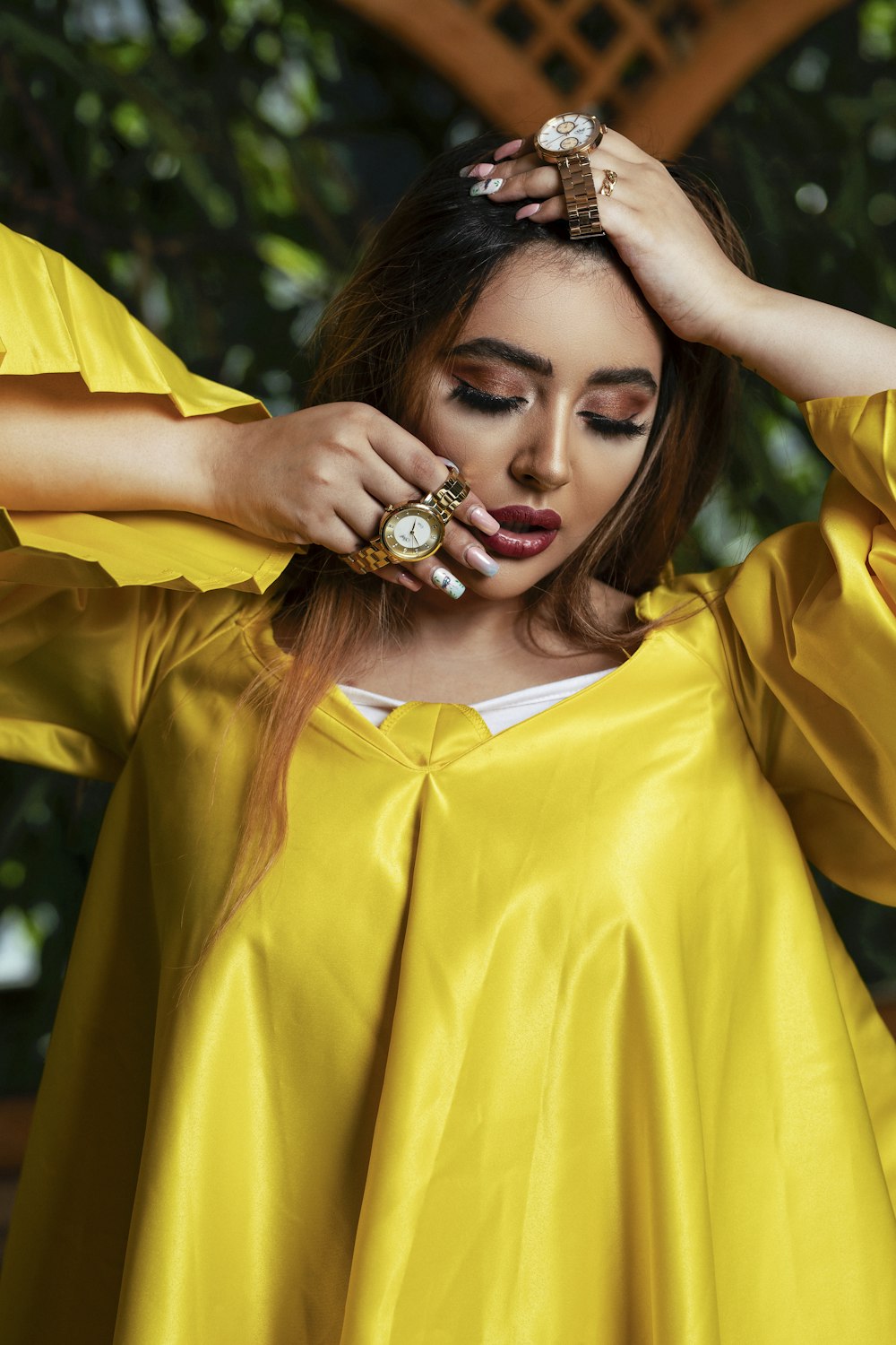 woman with two watches on her fingers