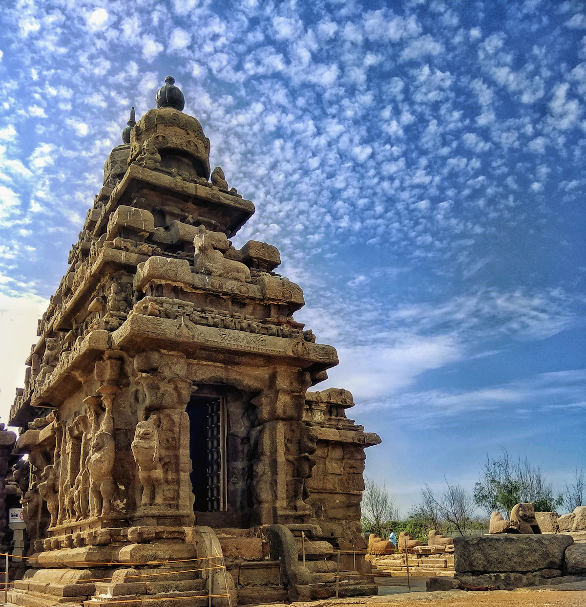A temple tower in Chennai under a blue sky