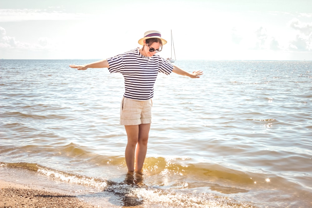 woman standing on seashore