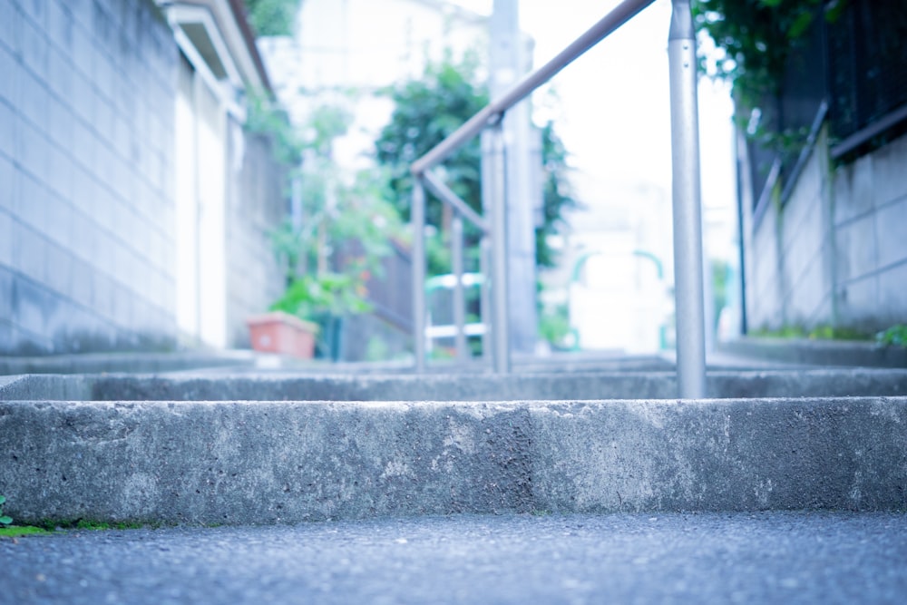 concrete stairs with metal handrail