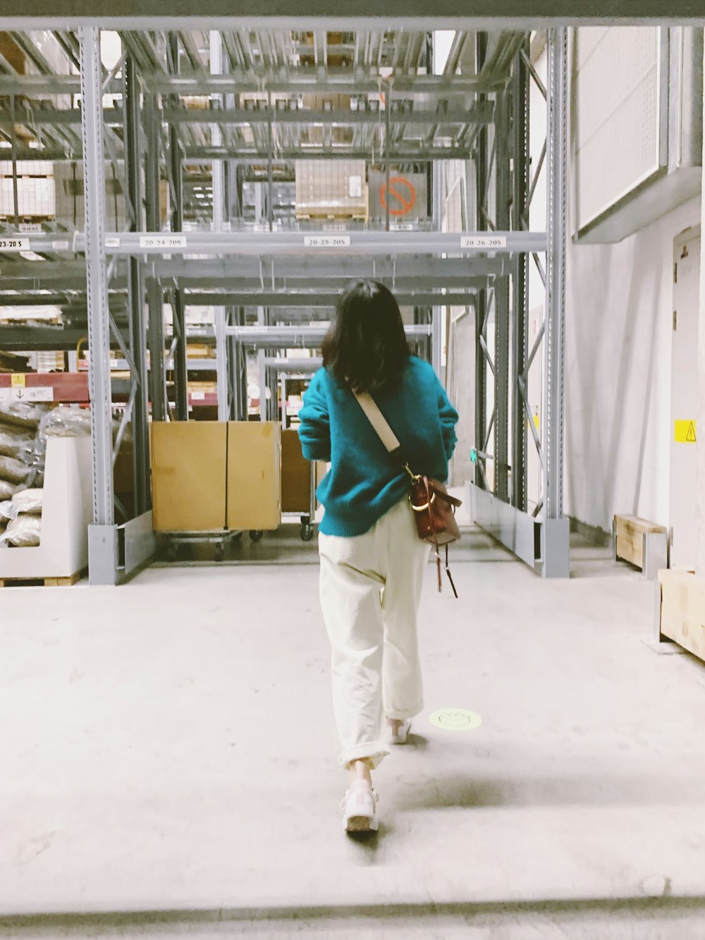 woman walking inside building