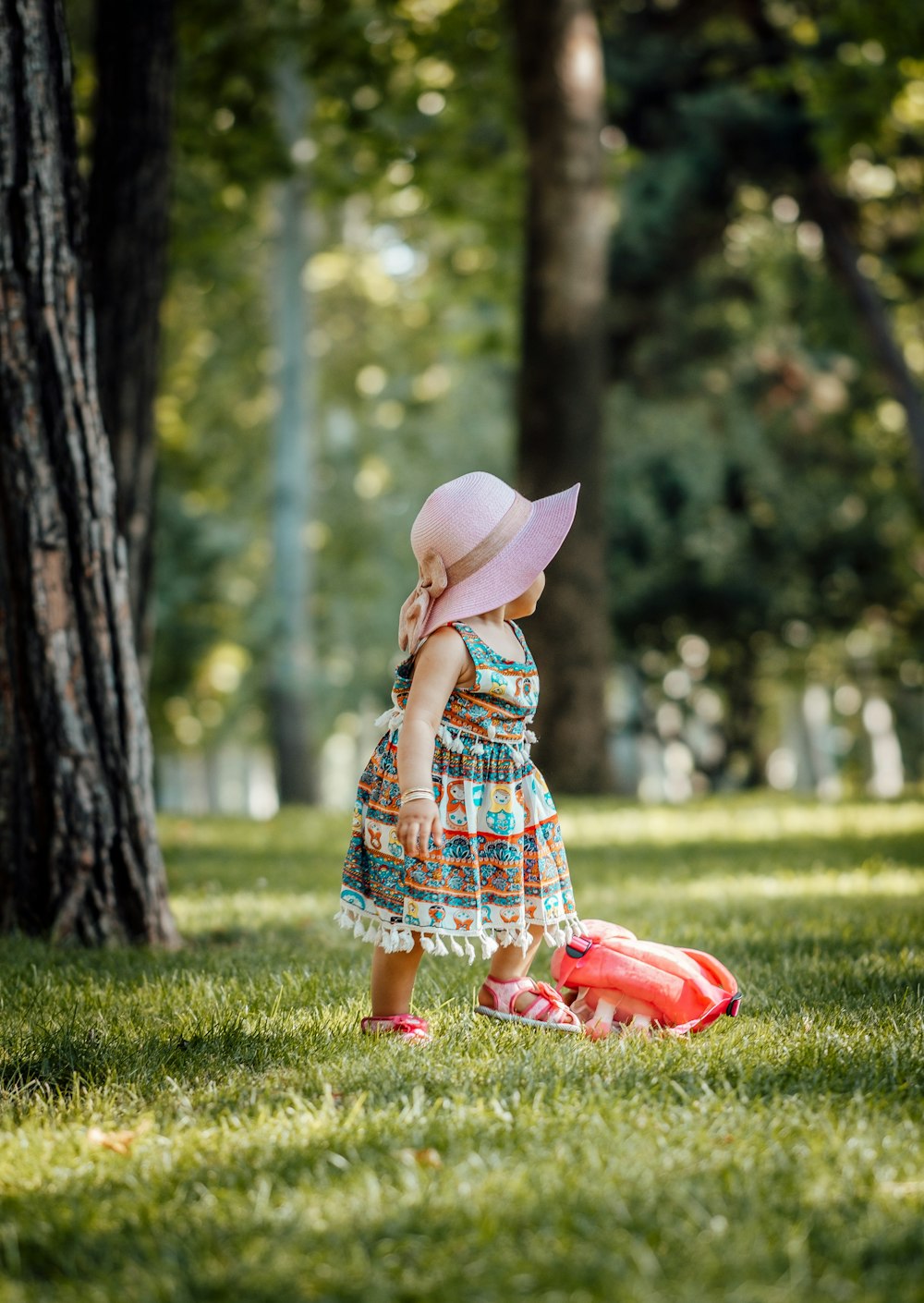 girl wearing pink hat