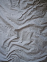 white bed sheet