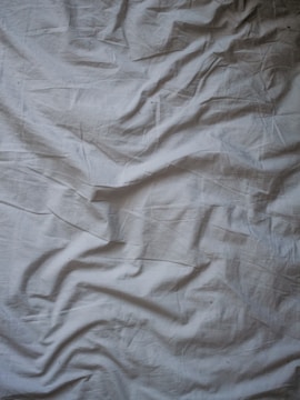 white bed sheet