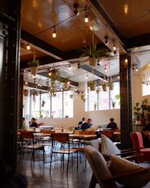 people inside restaurant during daytime