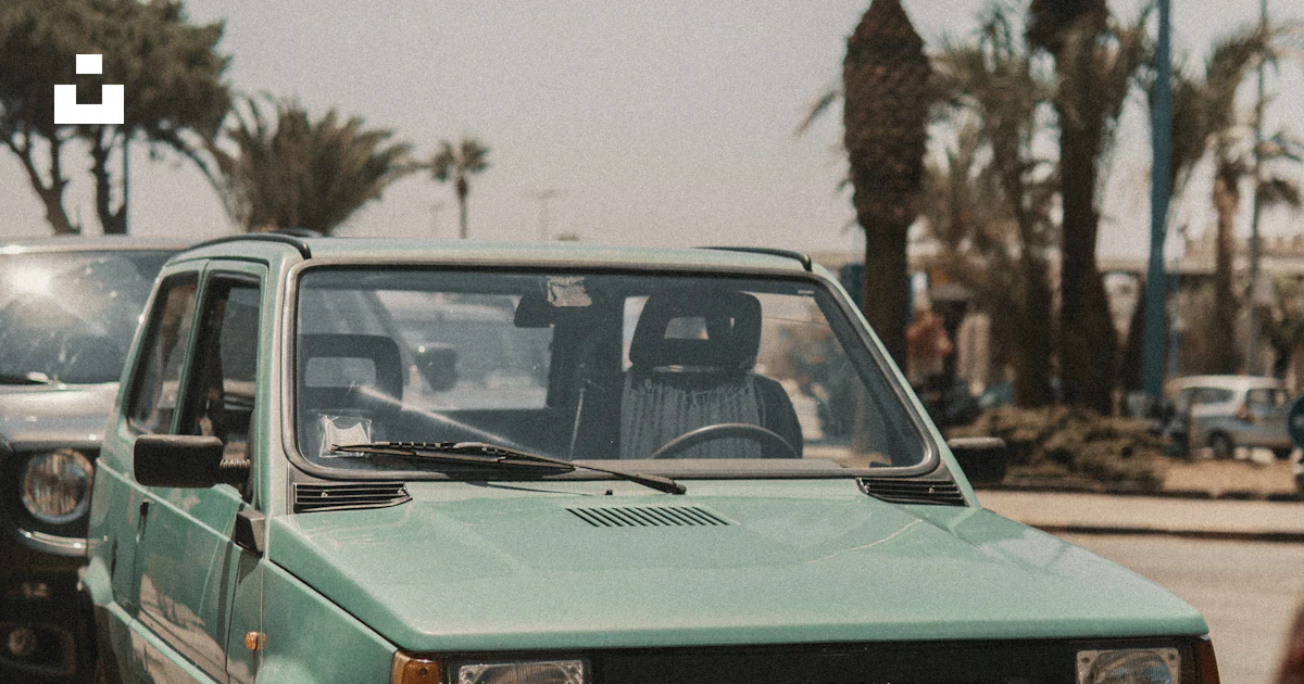 Teal FIAT vehicle photo – Free Car Image on Unsplash