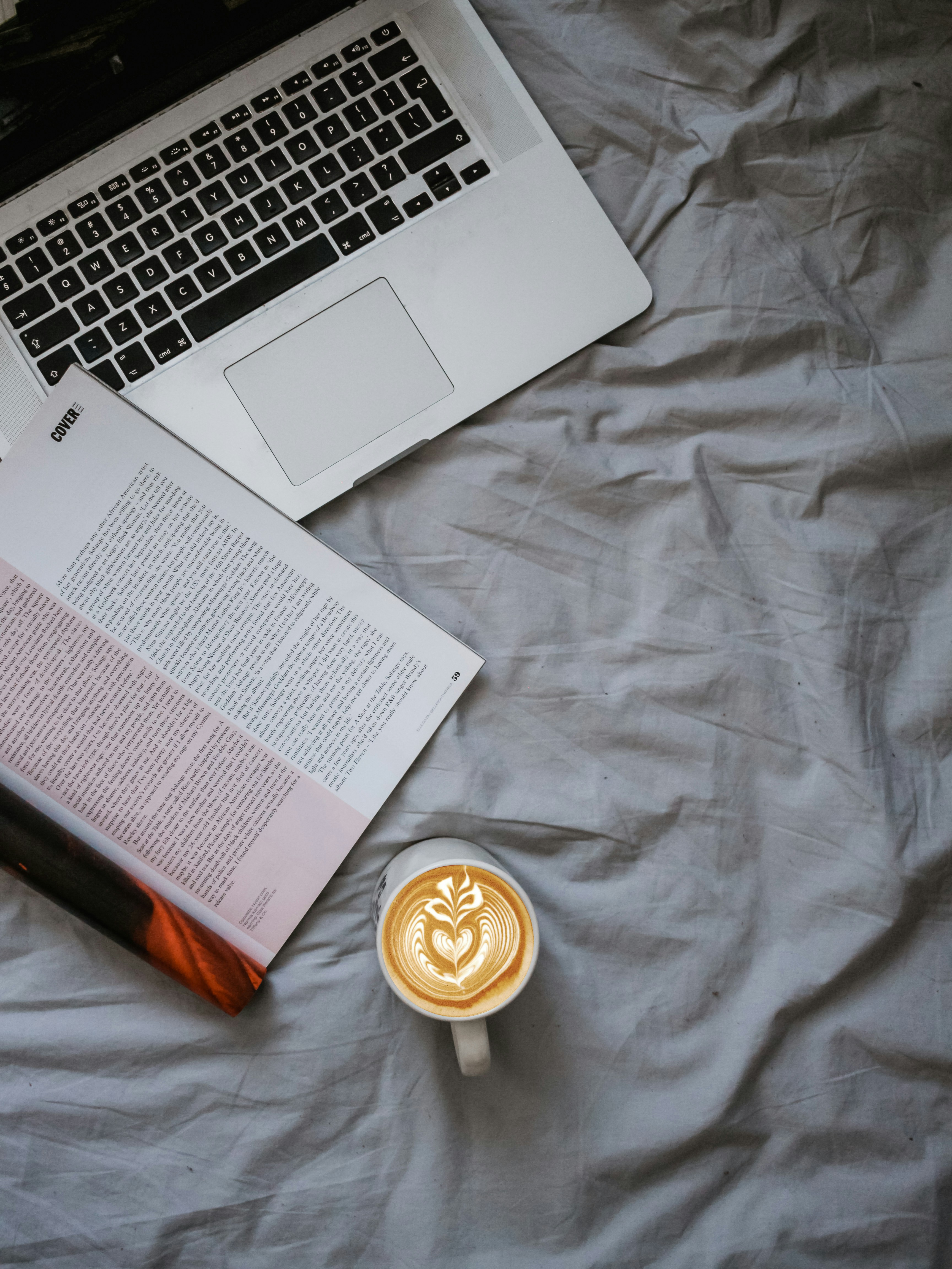 Book on MacBook Pro photo Free Grey Image on Unsplash