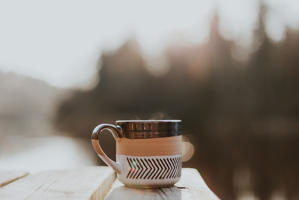 brown and white mug