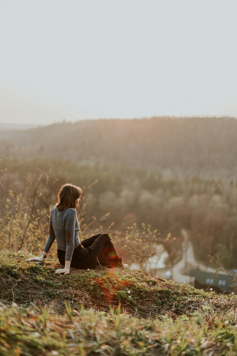 rule of thirds photography unknown person sitting outdoors