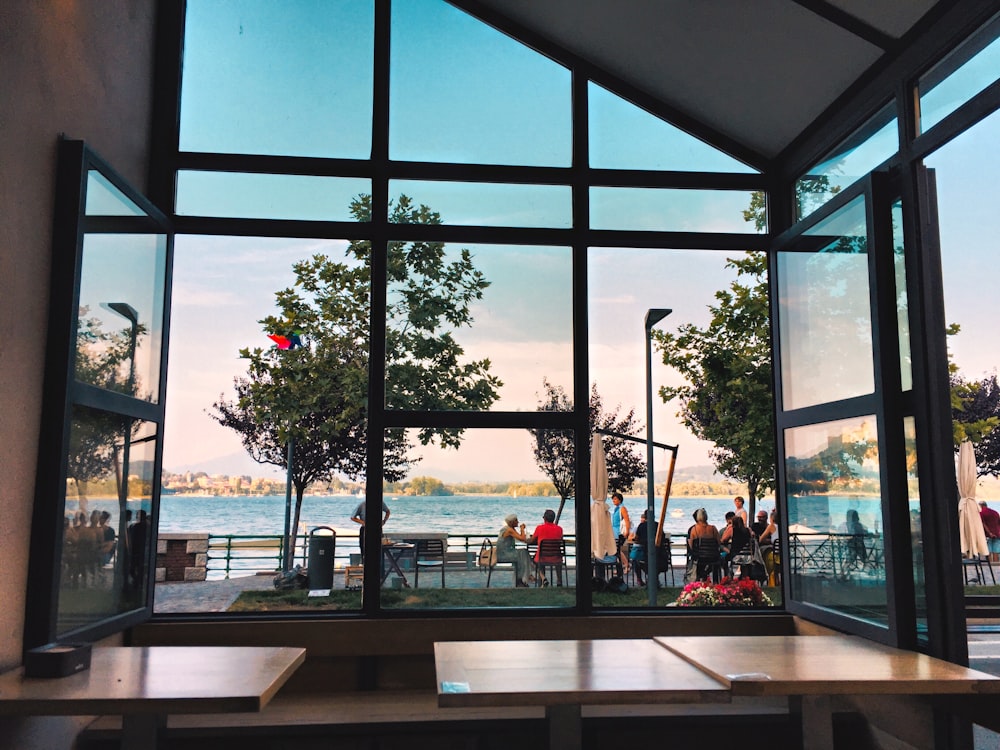 three brown wooden tables