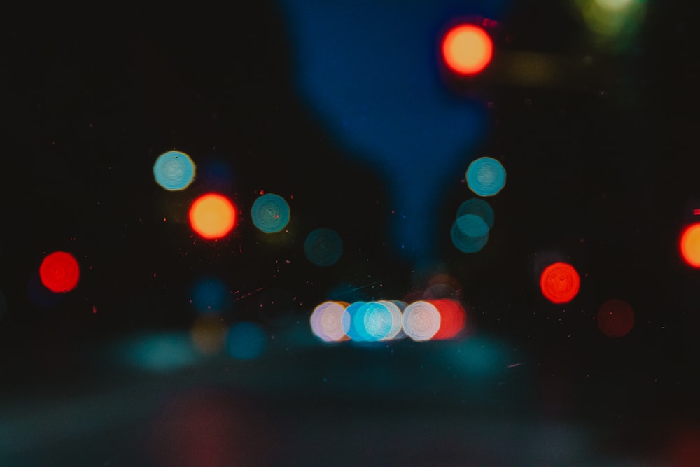 a blurry photo of a street with traffic lights
