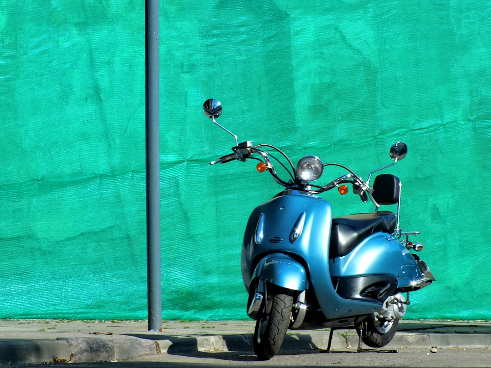 blue motor scooter