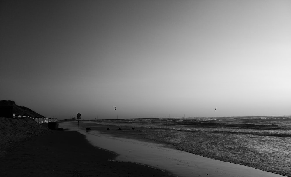 grayscale photo of beach