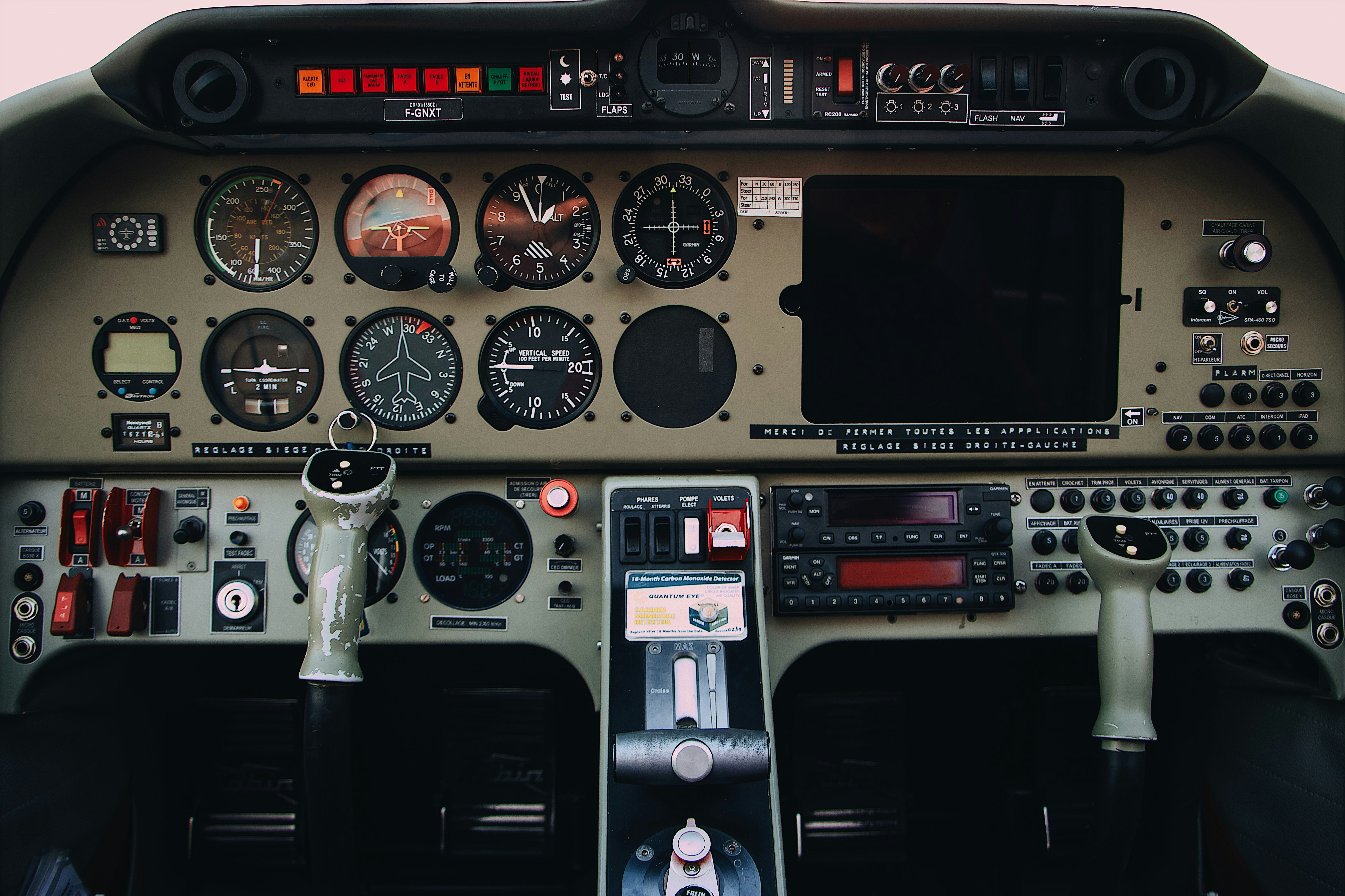 gray and black airplane control panels