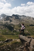 man standing on cliff