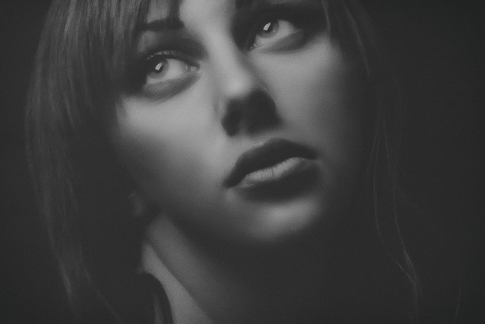 grayscale photoggraphy of woman's face