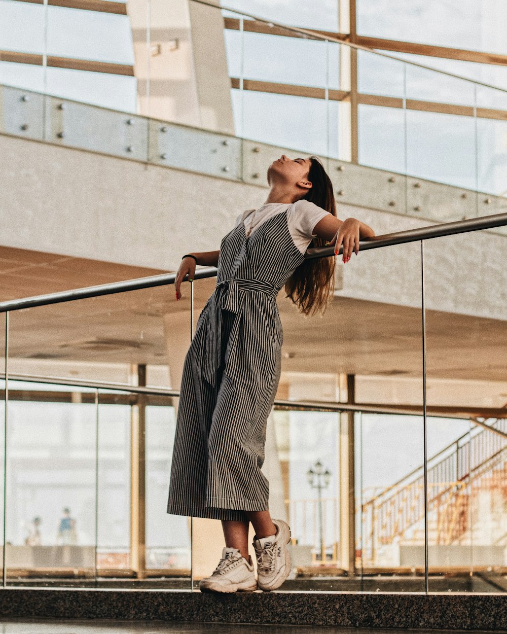 woman wearing grey dress