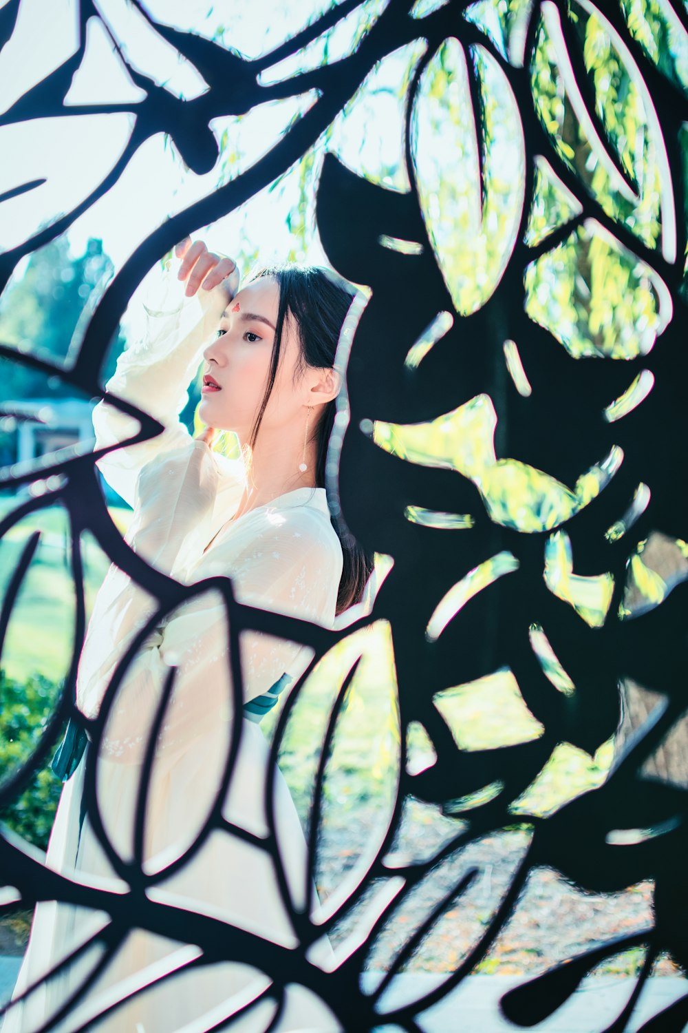 woman wearing white long-sleeved dress