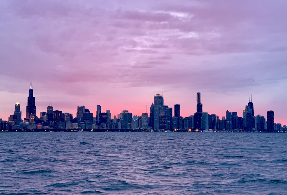 body of water across city buildings