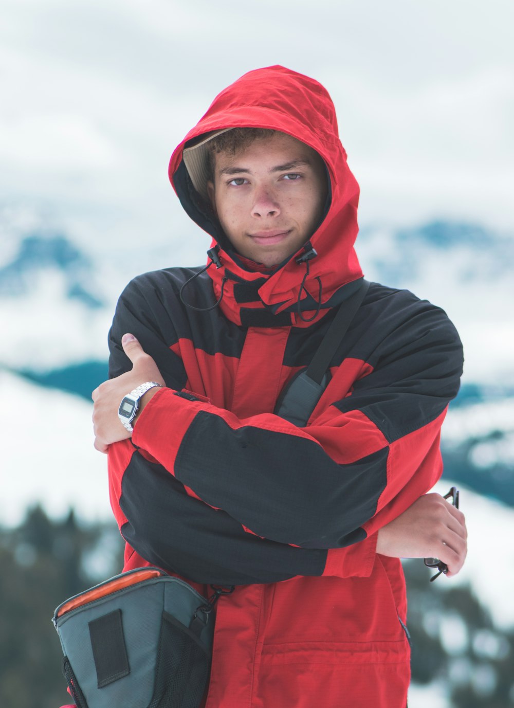 man wearing red and black jacket