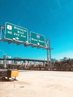 green and white signage