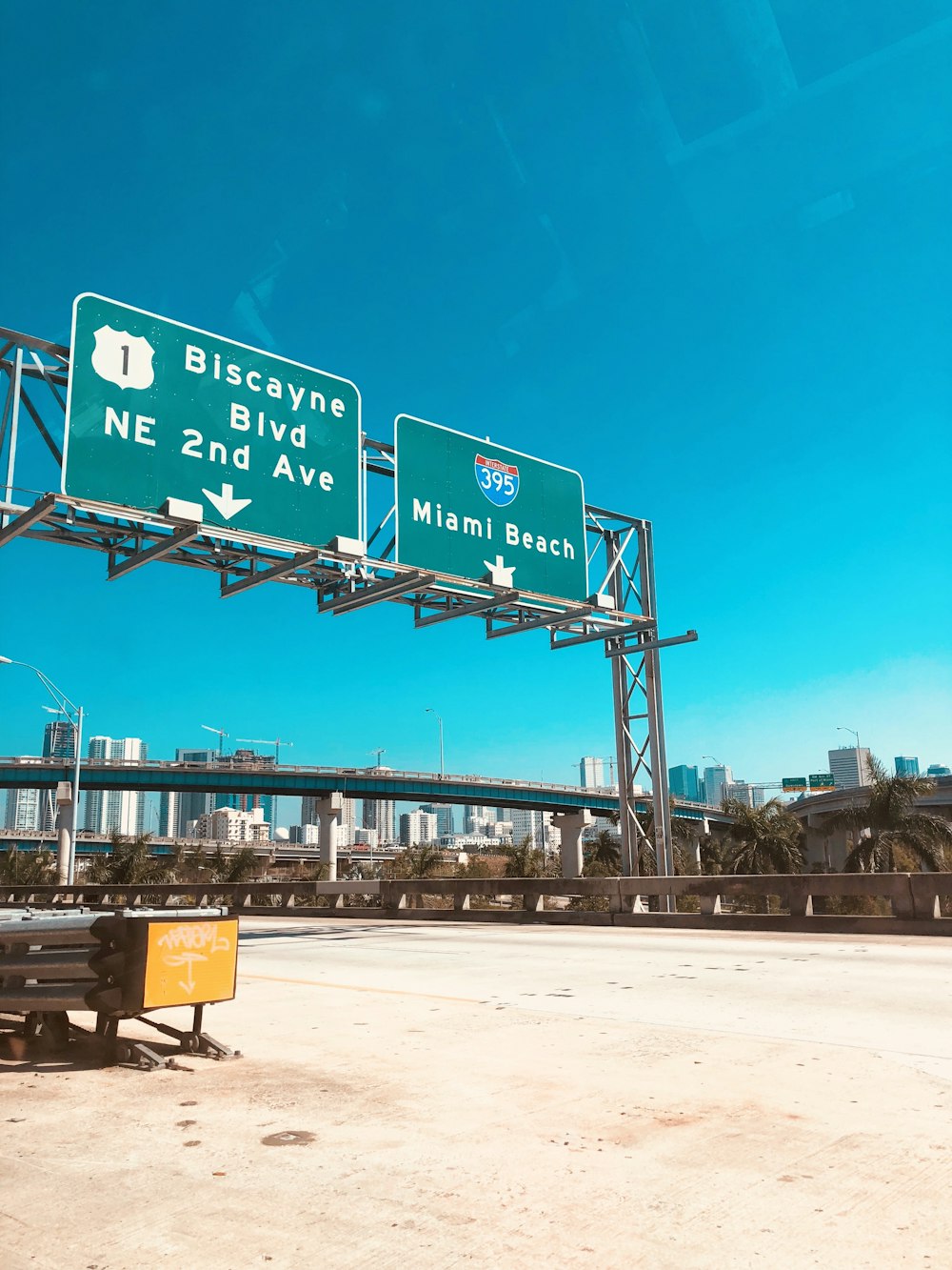 green and white signage